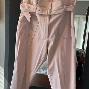 Tapered ankle paper bag pant from White House Black Market in pink. Size 14.